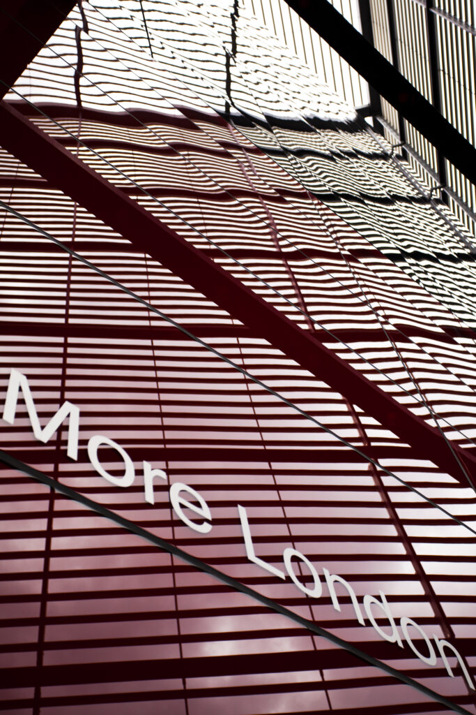 England, Greater London, Southwark. 'More London' caption displayed on the '6 More London Place' office space development near the River Thames.