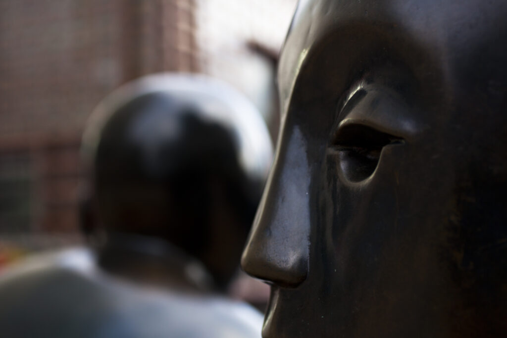 England, London, Docklands, Canary Wharf. Detail shot of statue / modern art in the heart of Canary Wharf financial district.