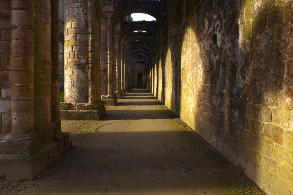 England, North Yorkshire, Fountains Abbey and Studley Royal World Heritage Site. Archetecture of Fountains Abbey, part of the Fountains Abbey and Studley Royal World Heritage Site located near Ripon.