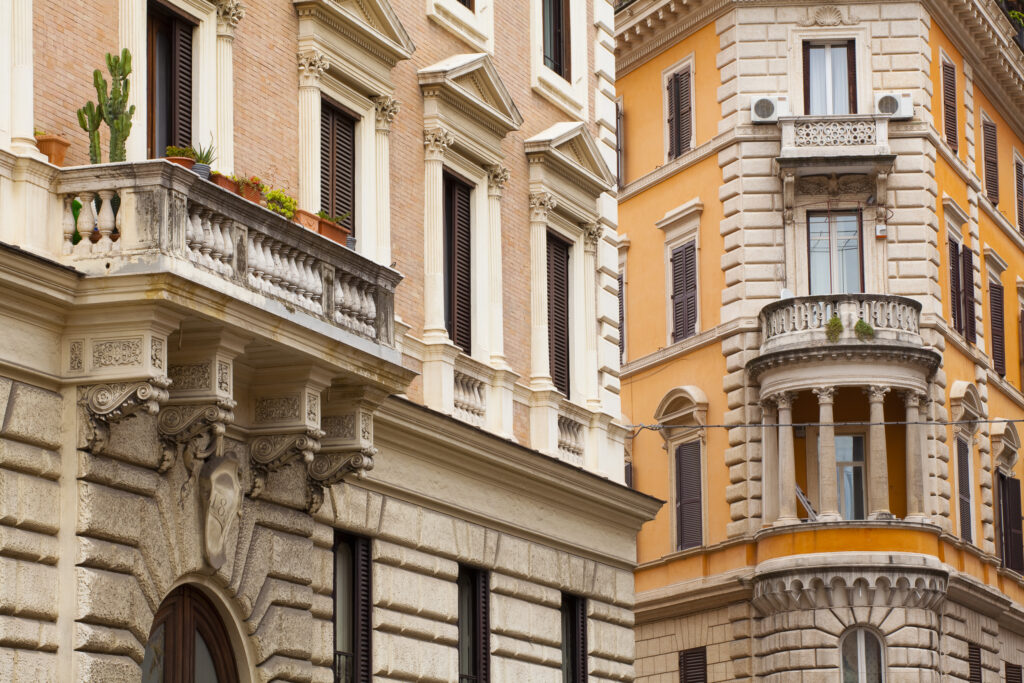 Italy, Lazio, Rome. Plants on a typical Rome residential apartment balcony.