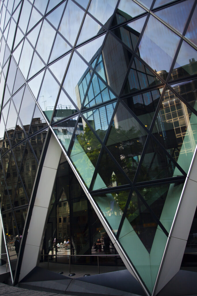 England, Greater London, The City of London. Abstract view of modern architecture including the famous Gherkin building, in the financial square mile in the City of London.