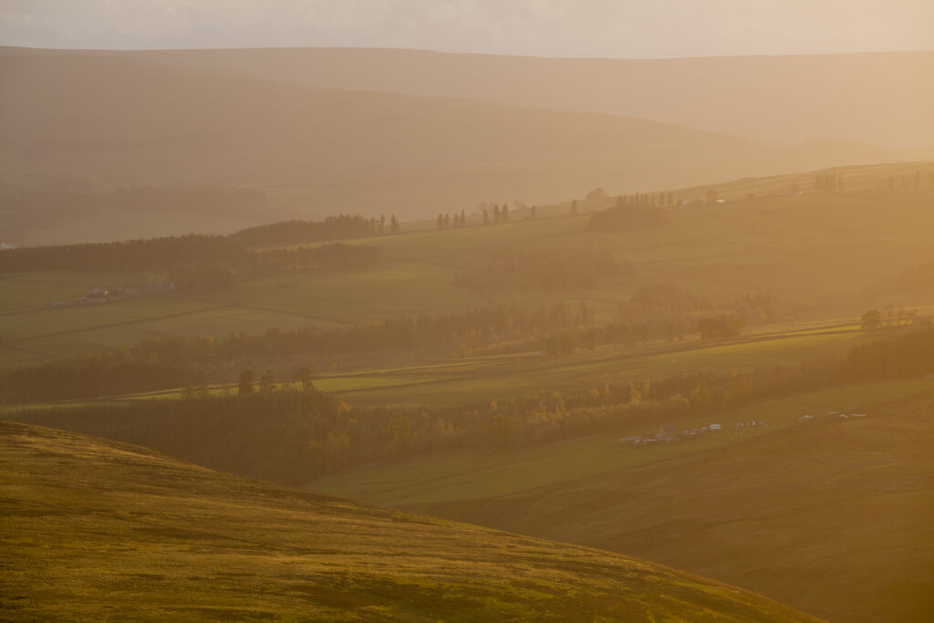 England, County Durham, Weardale. Hazy sunset over the hills of the Northern Pennines.