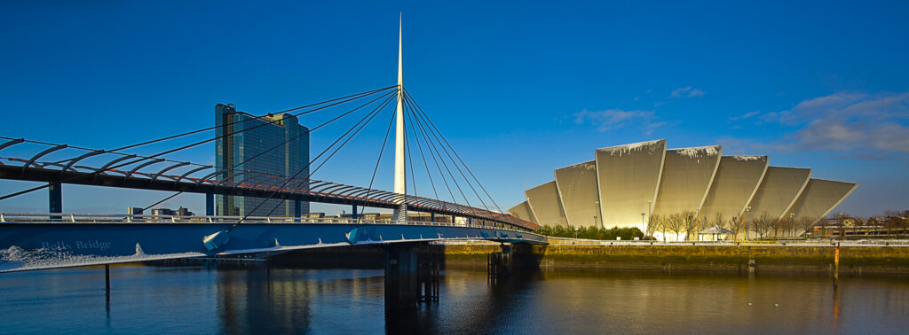 Scotland, Glasgow, Pacific Quay. Panoramic view of the Scottish Exhibition and Conference Centre located on the Pacific Quay near Bells Bridge on the River Clyde. The building is referred to locally as the Armadillo.