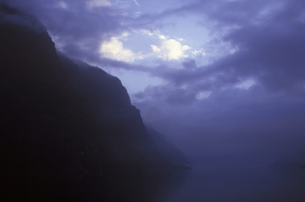 NORWAY, Sogn Og Fjordane, Aurlandsfjordan. The tranquil waters of the Aurlandsfjordan fjord a popular tourist destination