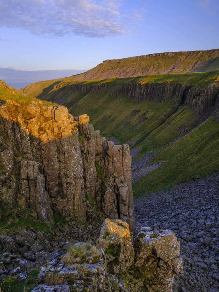 England, Cumbria, High Cup Nick. High Cup Gill — also known as High Cup Nick — is a strikingly symmetrical U-shaped valley carved deep into the Pennine escarpment near Appleby-in-Westmorland, Cumbria, within the North Pennines Area of Outstanding Natural Beauty.
