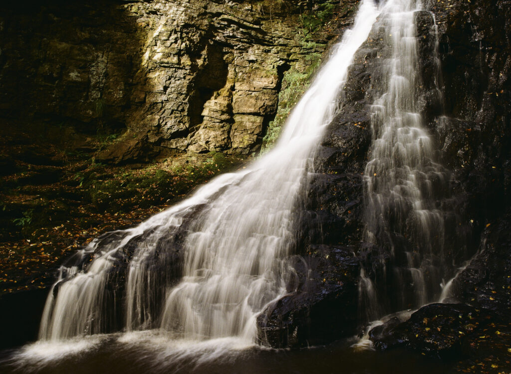 England, Northumberland, Hareshaw Linn. The flowing waterfall of Hareshaw Linn a popular spot located within Northumberland National Park.