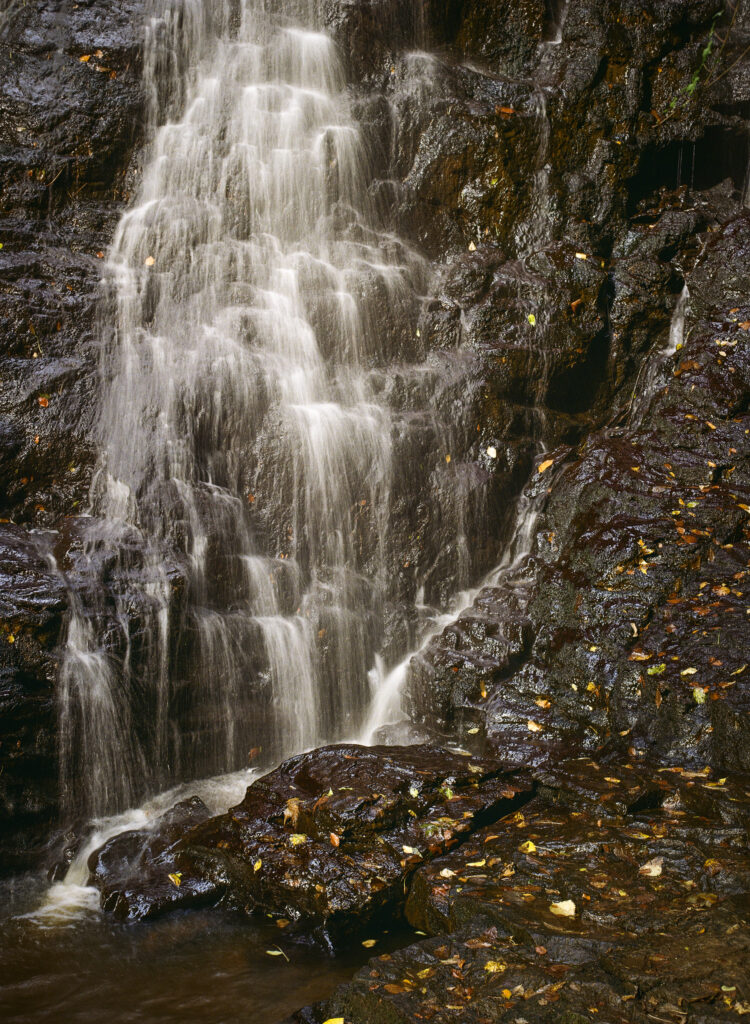 England, Northumberland, Hareshaw Linn. The flowing waterfall of Hareshaw Linn a popular spot located within Northumberland National Park.