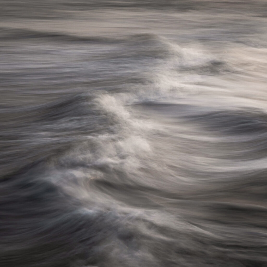 England, Tyne and Wear, Whitley Bay. Creative abstract image made using the Intentional Camera Movement (ICM) technique at the coast near St Marys Island.