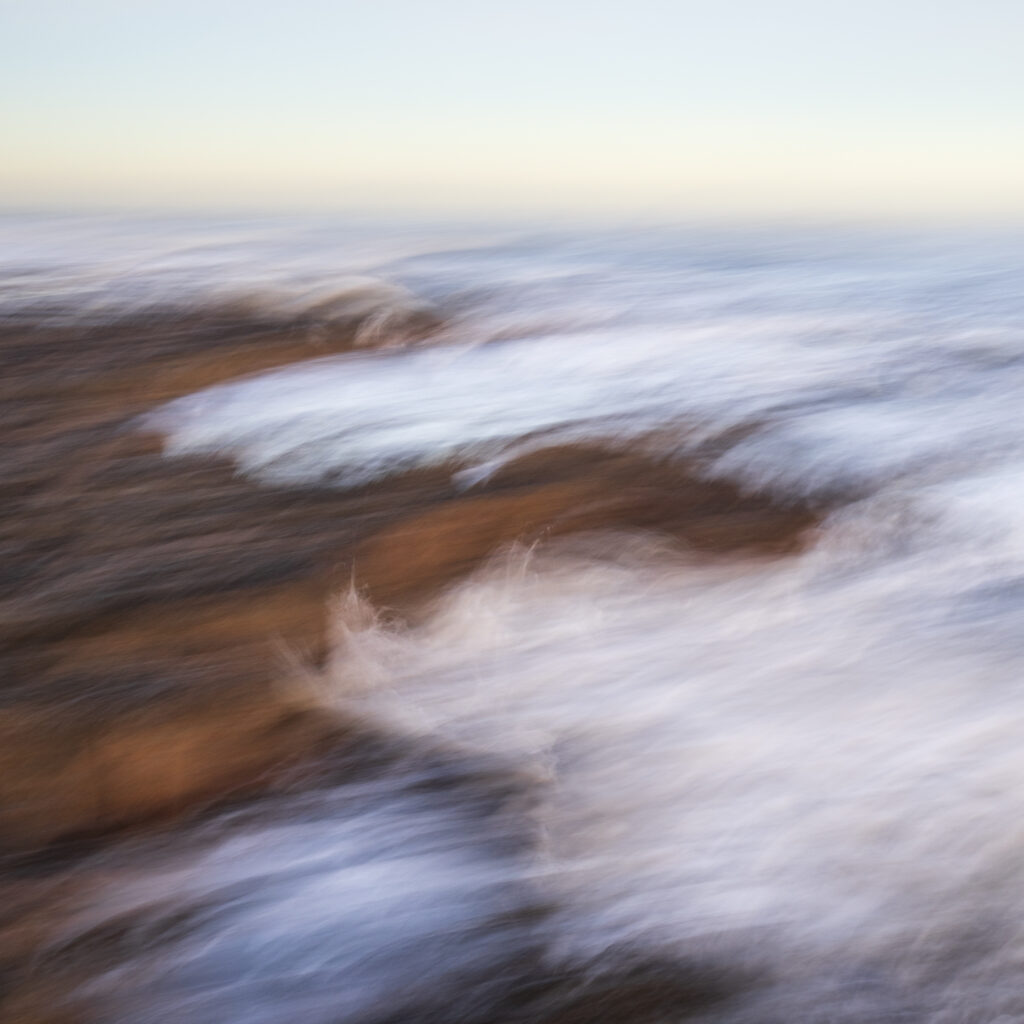 England, Tyne and Wear, Whitley Bay. Creative abstract image made using the Intentional Camera Movement (ICM) technique at the coast near St Marys Island.