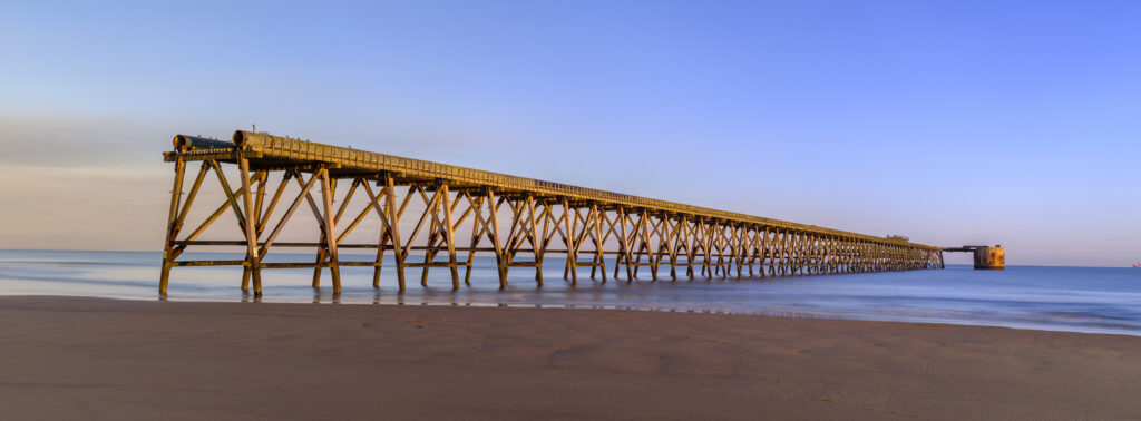 England, County Durham, Steetley Pier. Located near Hartlepool, Steetley Pier is a 2,000 foot long pier built in the 1960's to pipe sea water for the magnesia treatment works.