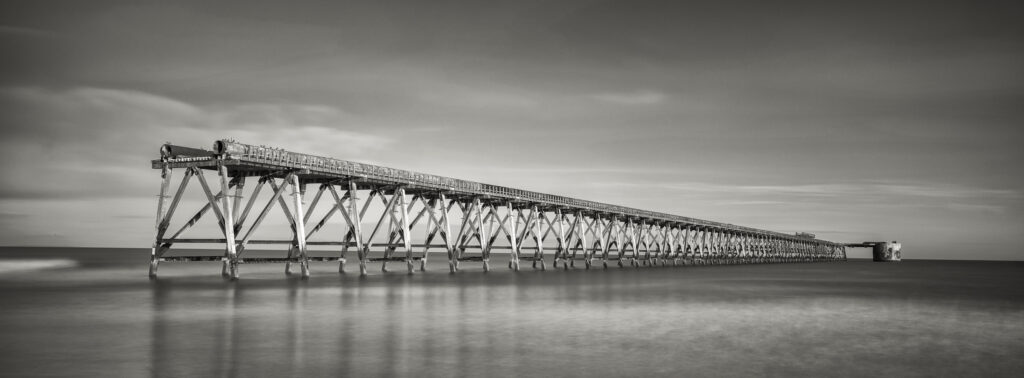England, County Durham, Steetley Pier. Located near Hartlepool, Steetley Pier is a 2,000 foot long pier built in the 1960's to pipe sea water for the magnesia treatment works.
