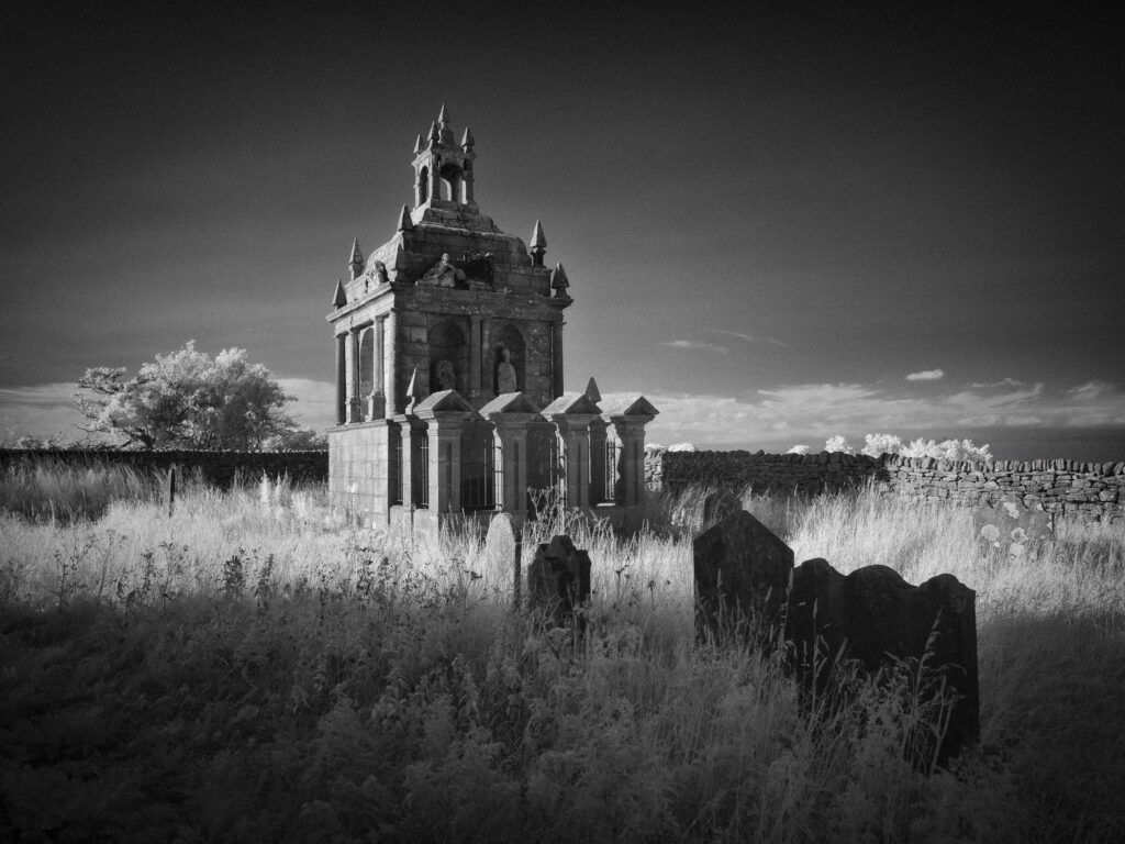England, Northumberland, St Andrew’s Church & the Hopper Mausoleum. Black & White infrared photo of the redundant church of St Andrew's & the Hopper Mausoleum.which stand isolated upon Greymare Hil near Shotley.